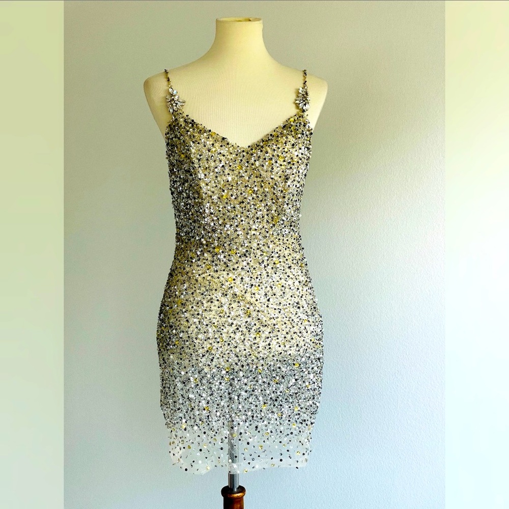Musani couture silver sequins mini dress. Size 8. NWT